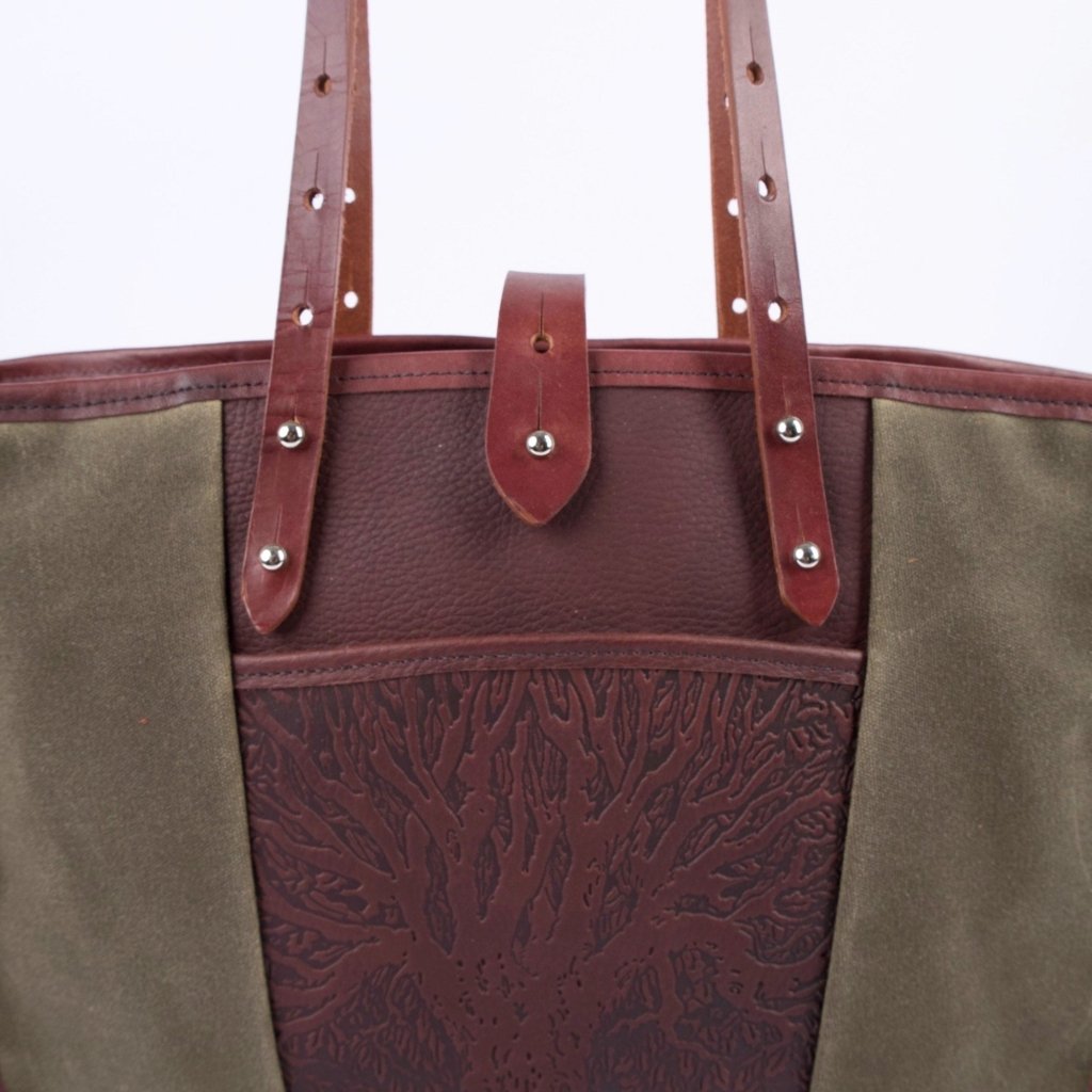 Leather and canvas tote from Oberon design tree of life close-up