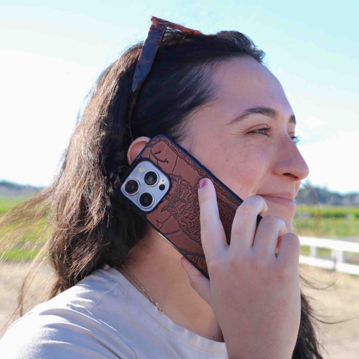 Oberon Design iPhone Case, Horned Owl in Saddle model lifestyle