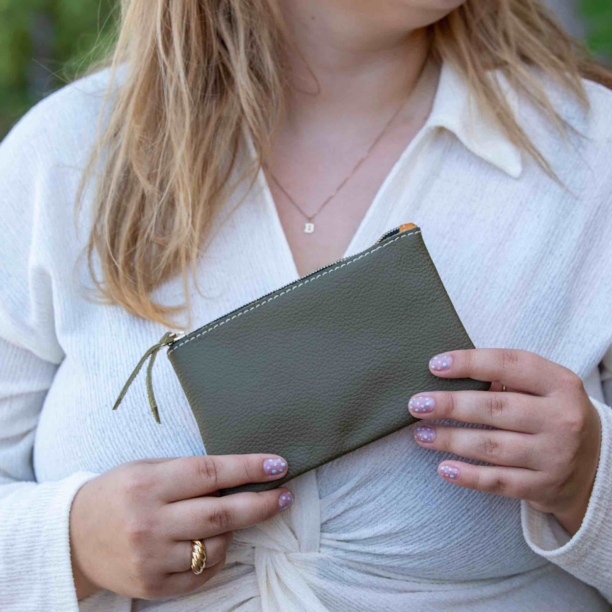 Oberon Design Zipper Pouch with Pacific Leather in Sage Lifestyle Holding Front